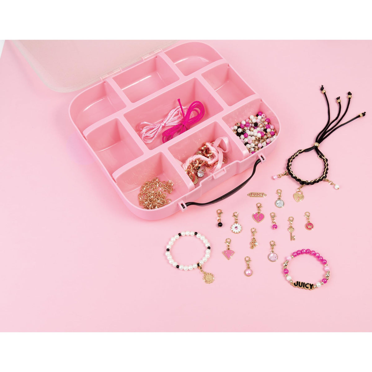 Make It Real Juicy Couture ribbon adds finishing touches to bracelets.