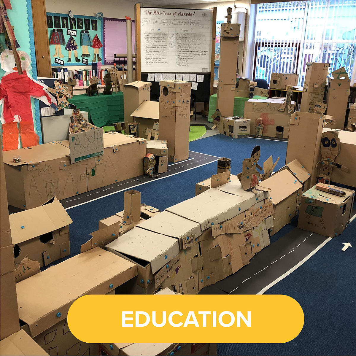 Makedo Invent kids collaborating in a small-group activity.