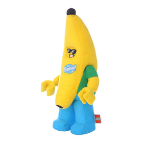 Manhattan Toy Banana Guy plush standing upright for display when not playing.