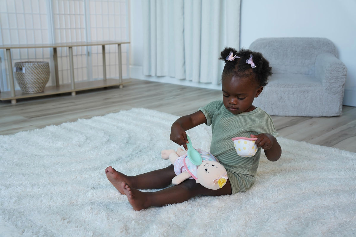 Fabric bib from Love Stella supports realistic feeding role-play