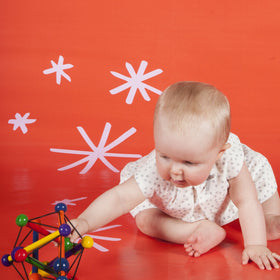 Manhattan Toy Skwish Classic 6-inch safe learning toy for curious babies.