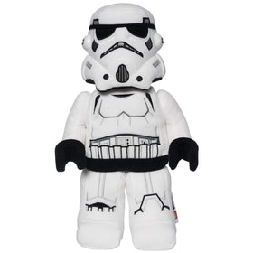 Manhattan Toy Stormtrooper plush standing upright on a shelf for display and play