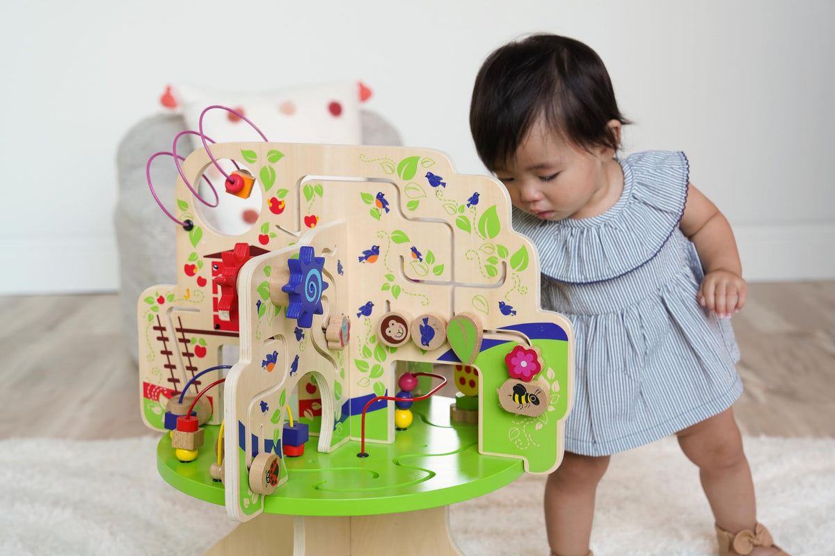 Manhattan Toy Tree Top Adventure promotes seated play for younger toddlers