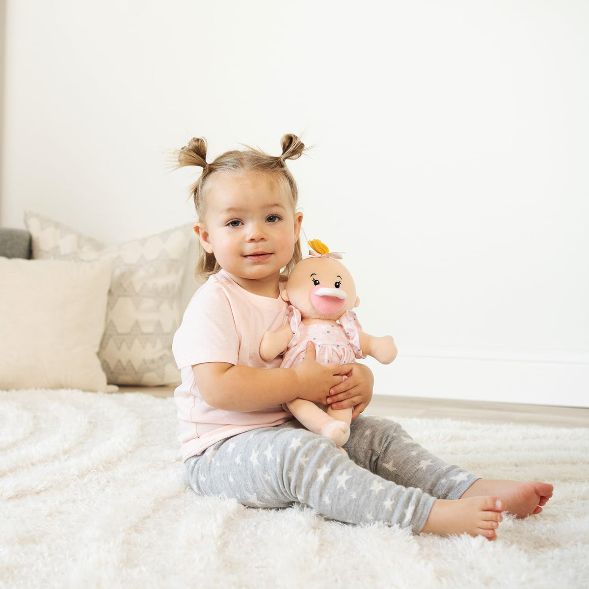 Manhattan Toy Wee Baby Stella Peach embroidered features add durability and gentle charm