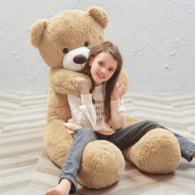 MaoGoLan teddy plush close-up showing warm brown fur and a soft, comforting texture.