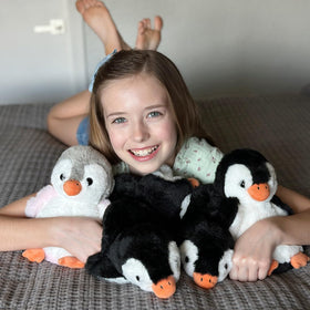 MaoGoLan penguin plush waving gesture greets guests on shelves or desks.