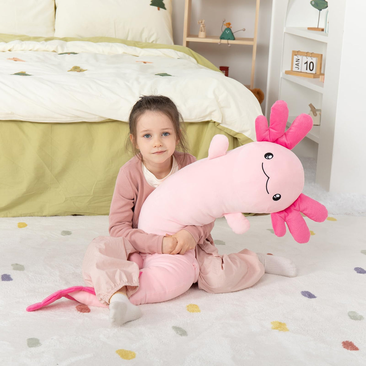 MaoGoLan axolotl plush with embroidered smiling eyes.