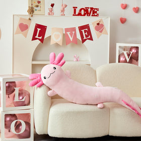 Long body axolotl cushion as decorative accent for sofa or bed.