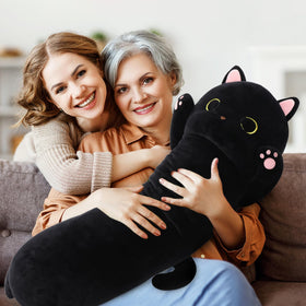 MaoGoLan oversized black cat plush as decorative bedside companion.
