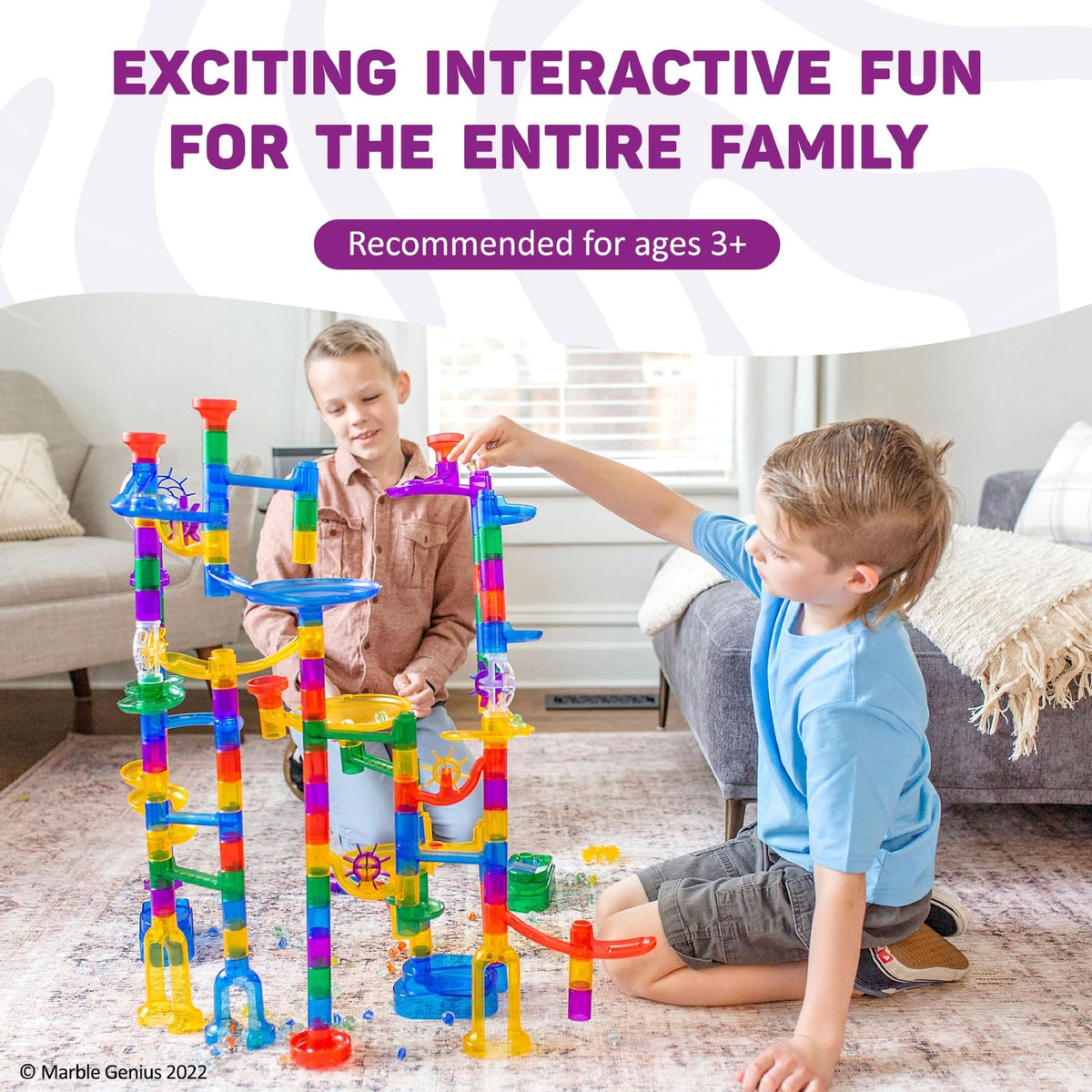 Marble Genius family holiday activity scene promotes cooperative play and learning