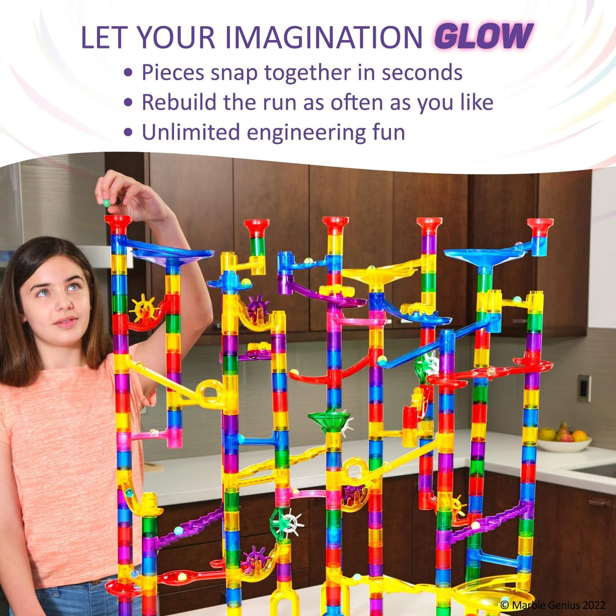 Marble Genius space-themed elements spark imaginative builds during play.