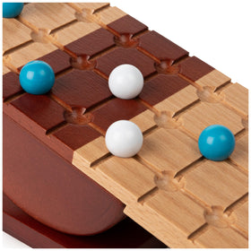 Marbles Rock Me Archimedes close-up marble emphasizes precision and careful maneuvering.