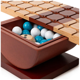 Marbles Rock Me Archimedes side view tower shows balancing challenge and tactile feedback.
