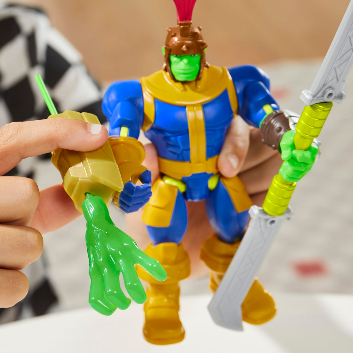 Action-ready 5-inch scale figure shown for desk or shelf play.