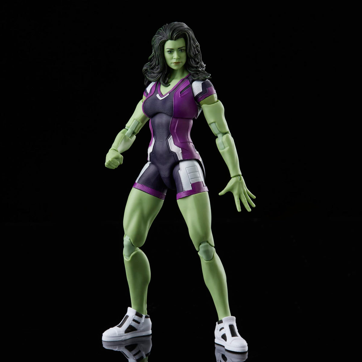 Marvel Legends She-Hulk figure highlighting premium articulation for versatile superhero poses.