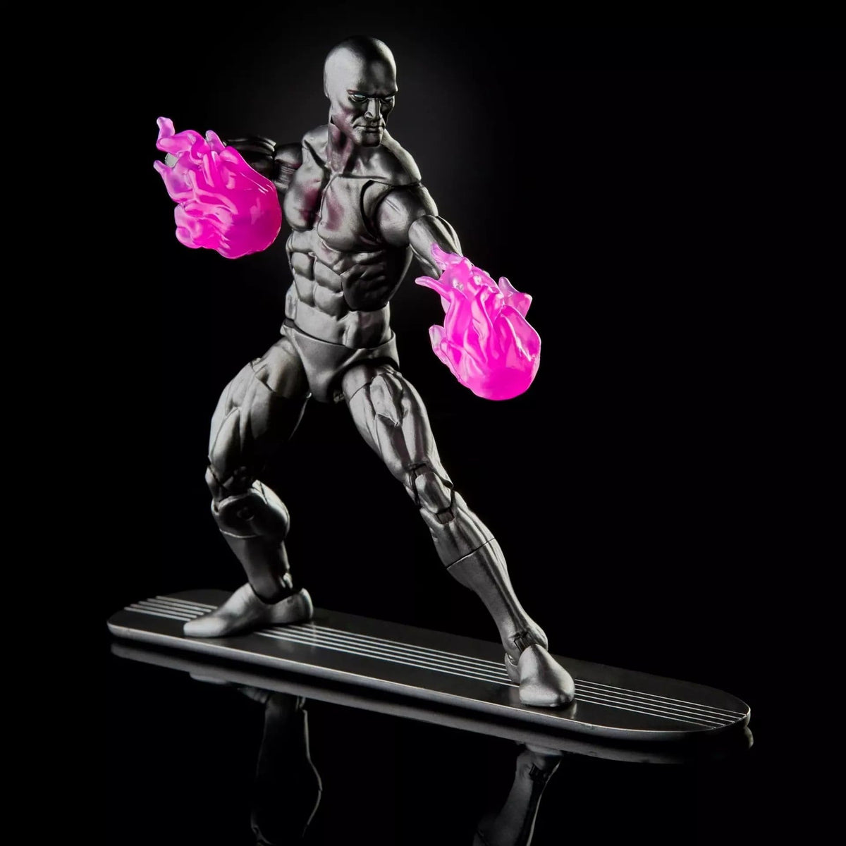 Marvel Legends Silver Surfer dynamic pose in a collection diorama