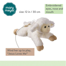 Mary Meyer Melody wind-up lamb toy in infant hands, soothing on the go