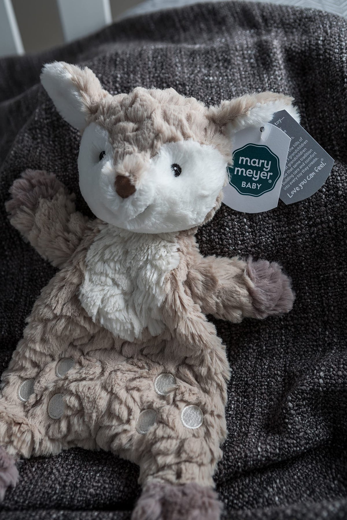 Mary Meyer Putty Fawn Lovey's understuffed, floppy body is easy to grasp