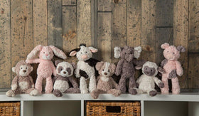 Mary Meyer Putty Lamb resting on plush blanket for comforting nap time