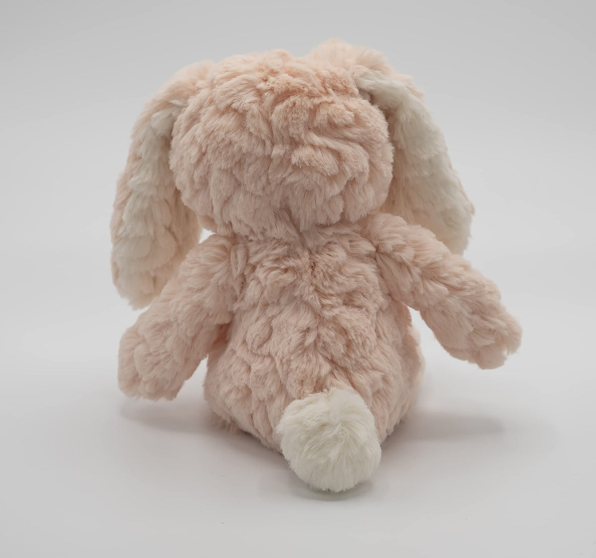 Mary Meyer Putty Pups blush bunny weighted bum and feet offer a secure, comforting hold.