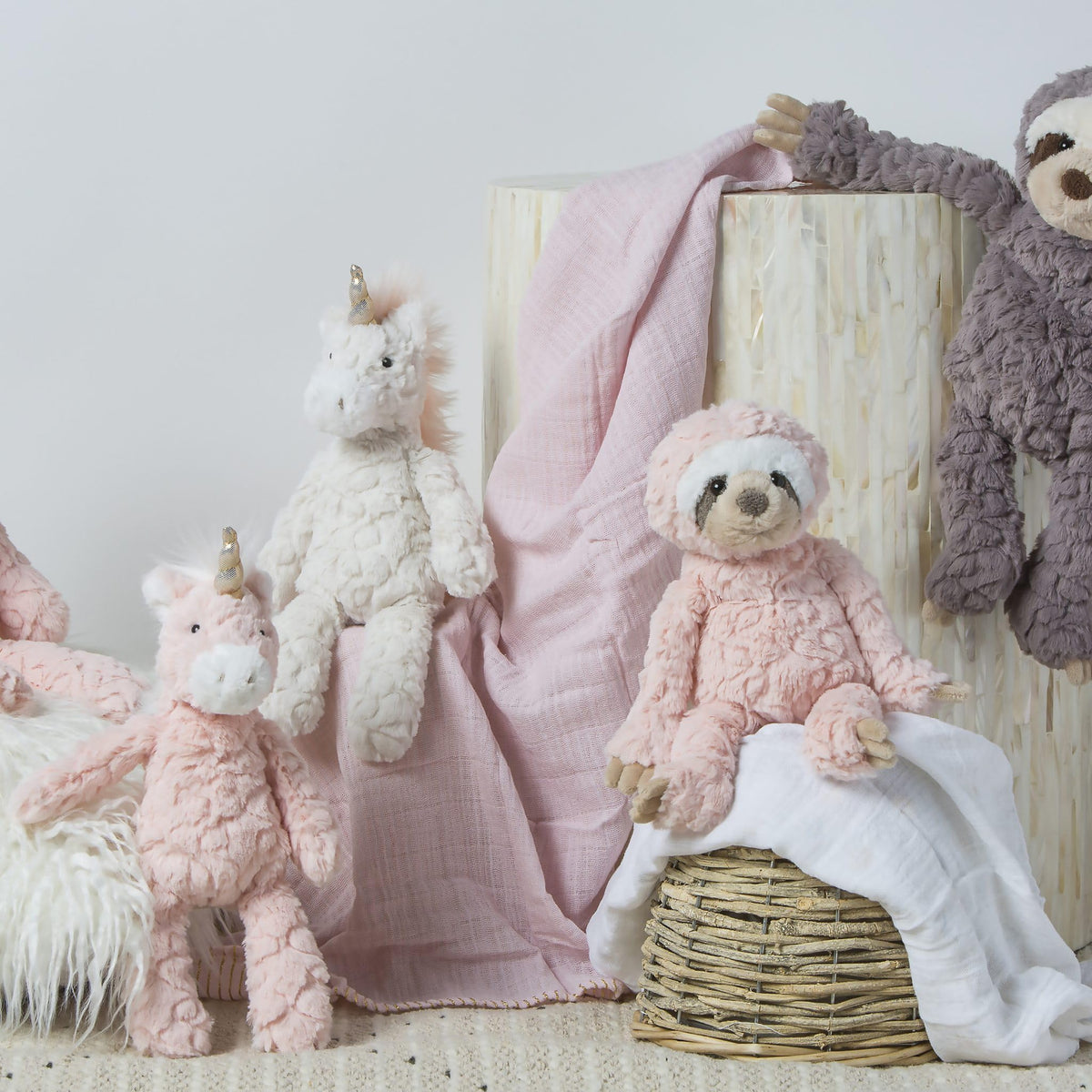 Mary Meyer Putty Unicorn weighted feet provide steady cuddly support