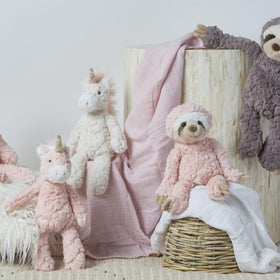 Mary Meyer Putty Unicorn weighted feet provide steady cuddly support