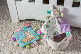 Taggies Flora Fawn plush toy with comforting features and friendly expression.
