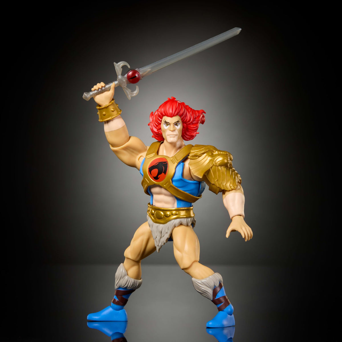 Sword of Omens with clear Eye of Thundera on Lion-O figure for enhanced display.