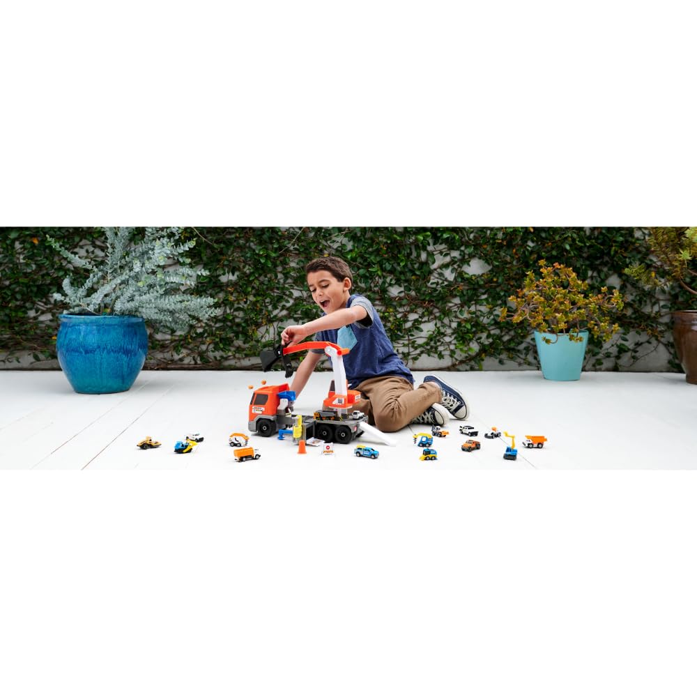 Matchbox 1:64-scale dump truck on the larger truck enables realistic site operation