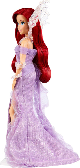 Mattel Ariel splash-inspired collar enhances outfit for collector display.