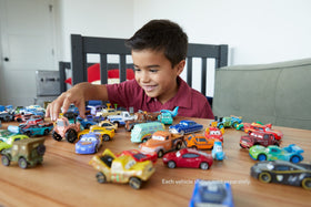 Mattel Disney Cars Deluxe Mack side view highlights signature colors for storytelling.
