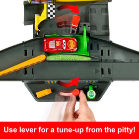 Pit-stop station lets kids briefly service cars during the race.