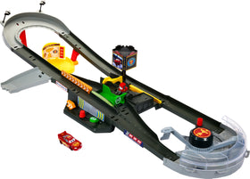 Mattel Disney Pixar Cars track set highlights fast-paced Piston Cup action on a versatile speedway.