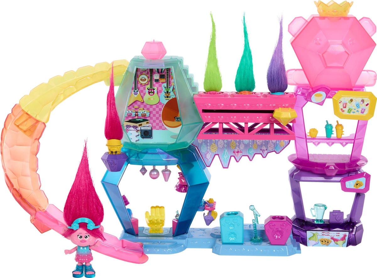 Mattel DreamWorks Trolls Mount Rageous Queen Poppy doll beside the playset for imaginative storytelling