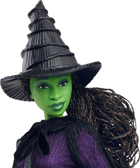 Mattel Elphaba iconic hat, broom, and satchel complete the signature silhouette