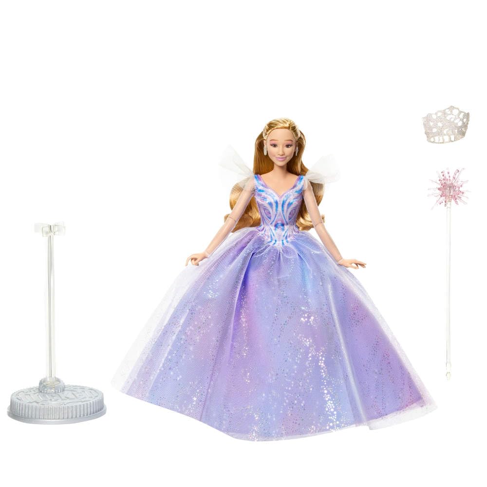 Mattel Glinda blonde curls frame a classic look.