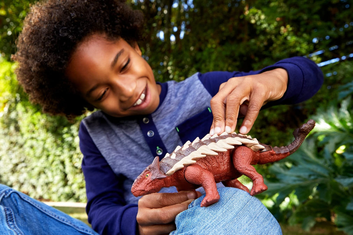 Mattel Jurassic World Dominion Roar Strikers Ankylosaurus performing tail whip for exciting pretend battles.