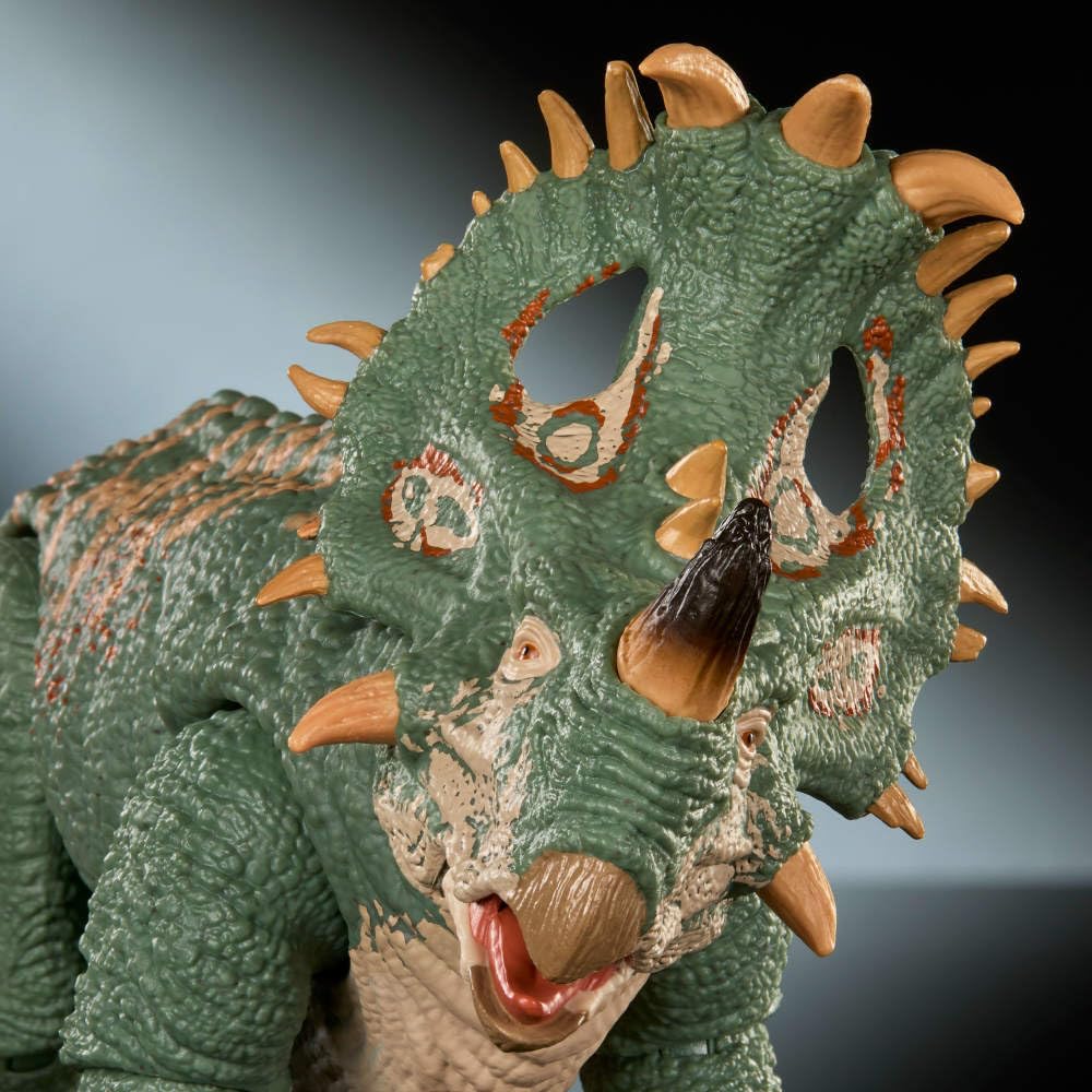 Mattel Jurassic World Hammond Sinoceratops deluxe figure showcasing 14 articulations for dynamic poses.