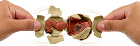 Mattel Jurassic World Hidden Hatchers Tiger Atrociraptor egg to dino for dynamic play.
