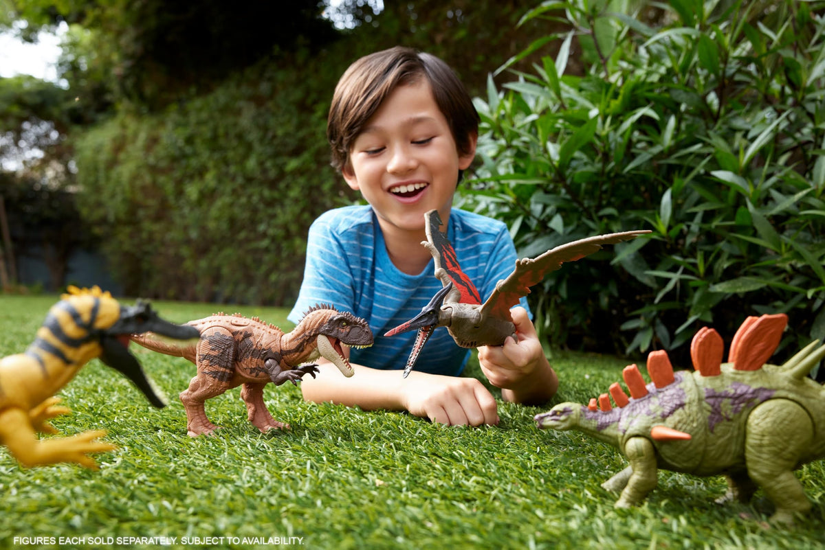 Mattel Jurassic World tail-attack action highlighting dynamic dinosaur strike.