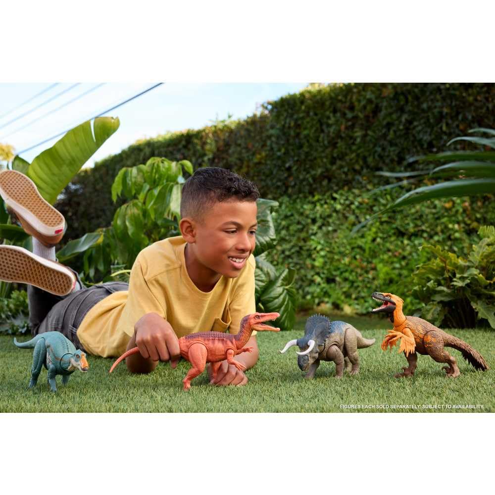 Mattel Jurassic World tail-control demonstrates chomp action and adjustable battle direction.