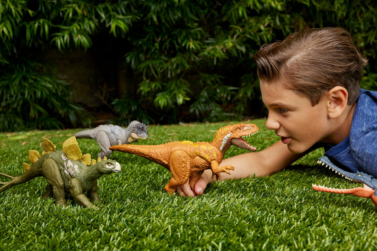 Mattel Jurassic World Wild Roar Megalosaurus roars during storytelling.