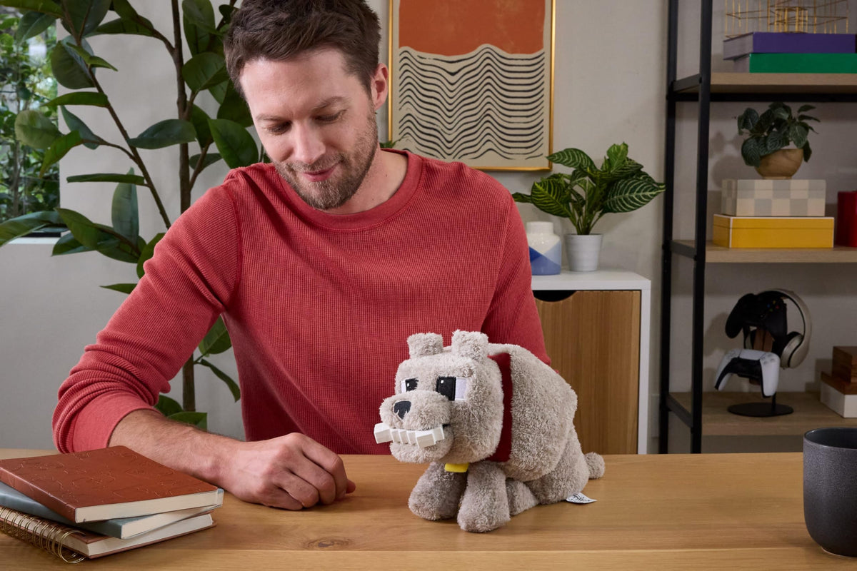 Dennis Wolf plush mouth action activates when feeding the bone for interactivity.