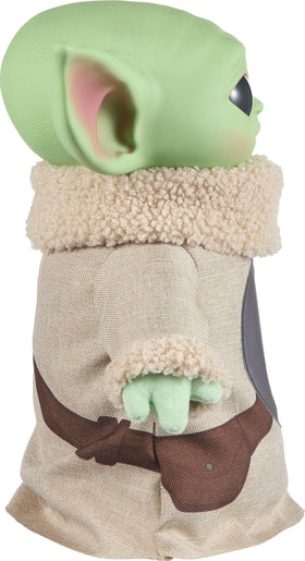 Mattel Grogu plush sits on a bean-filled base for stable display.