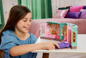 Mattel Wicked dorm playset: Elphaba bed reveal feature sparks discovery play.
