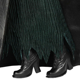 Braided hair and vibrant green finish reflect the on-screen design.
