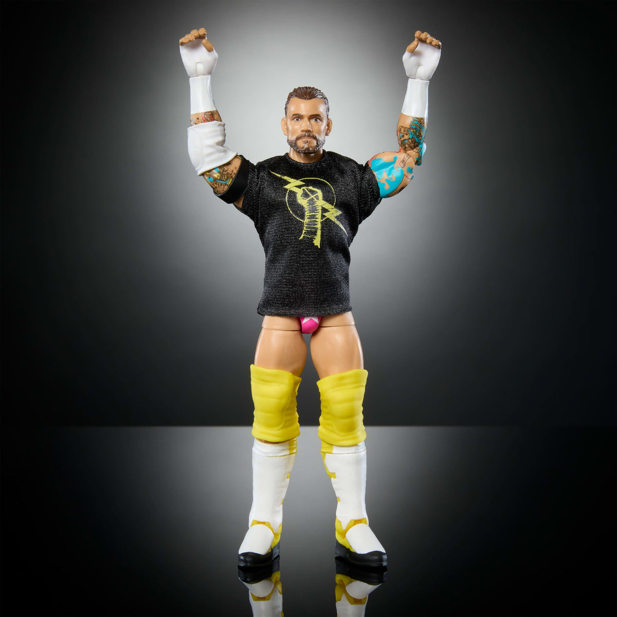 Packaging and figure shown in a dynamic stance from Mattel WWE Elite 113 CM Punk.
