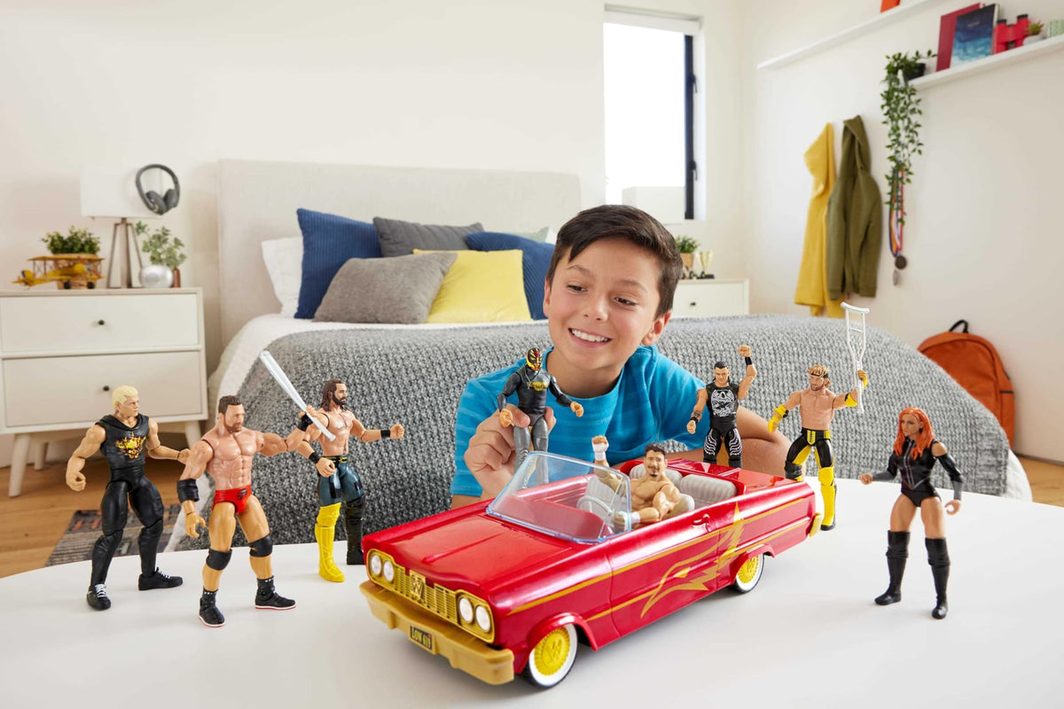 Mattel WWE Rey Mysterio main event figure with articulated joints for dynamic poses.