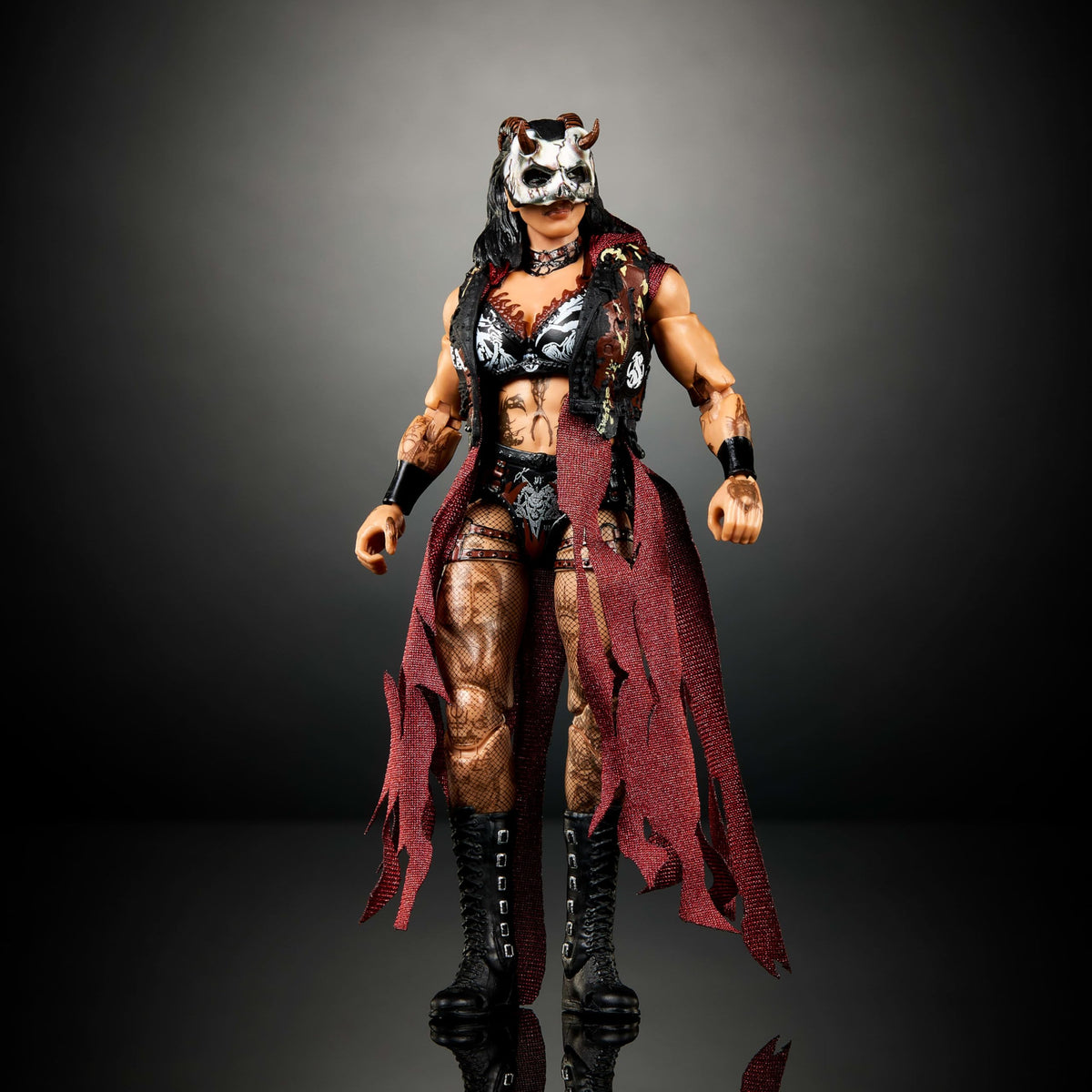 Mattel WWE Ultimate Edition Rhea Ripley includes authentic ring gear and accessories for realism.