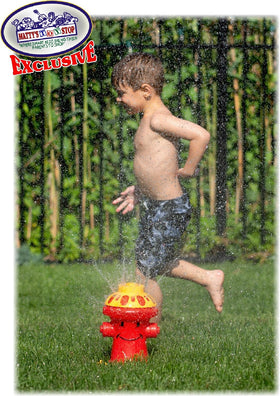 Henry Hydrant in backyard with kids enjoying spray